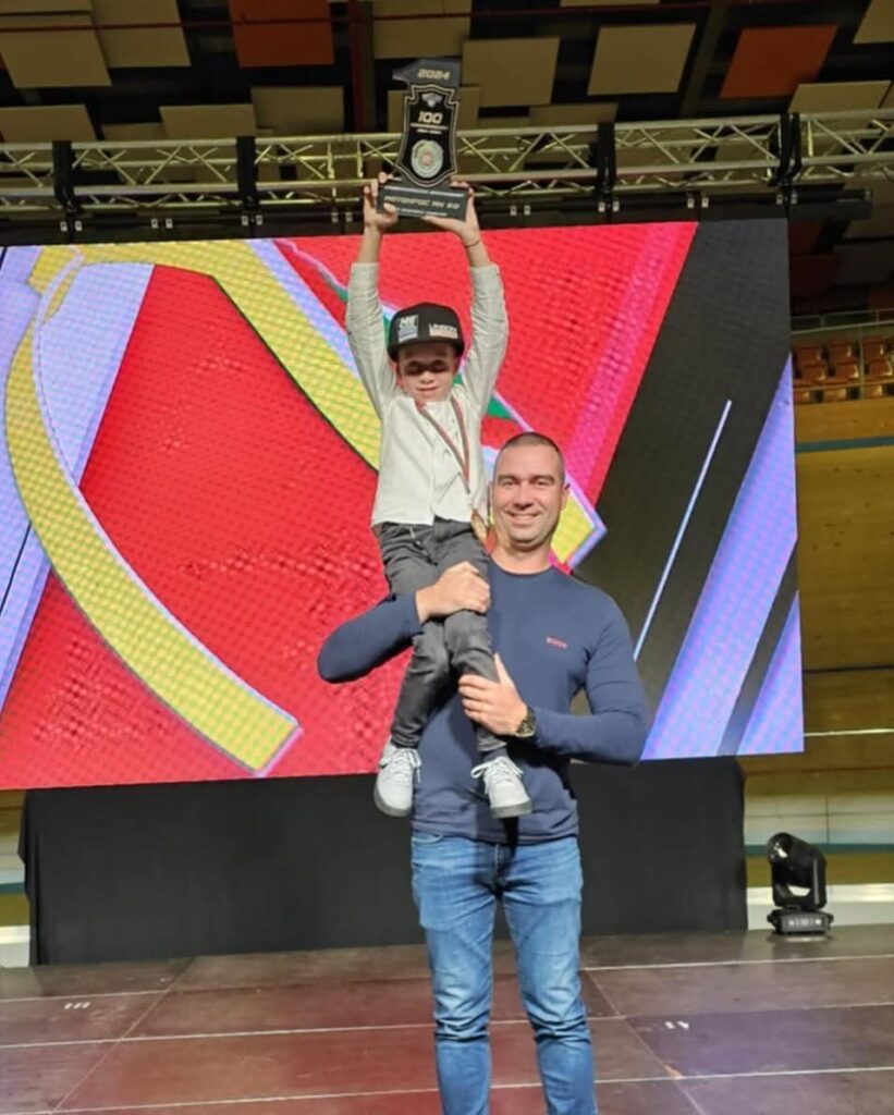 Radi lifts the trophy at the Bulgarian Motorcycling Federation awards, 2024