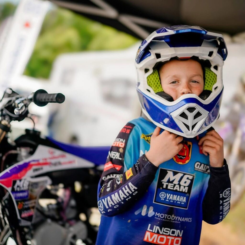 Radi puts on his helmet before the start