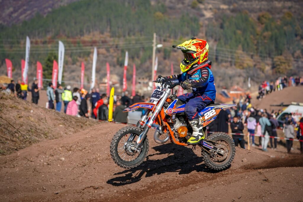 Radi (#22) jumping in front of the crowd, 2022