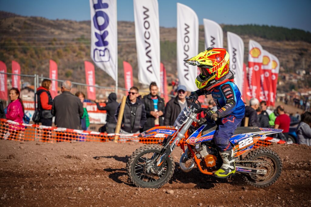 Radi (#22) cornering in front of the crowd, 2022